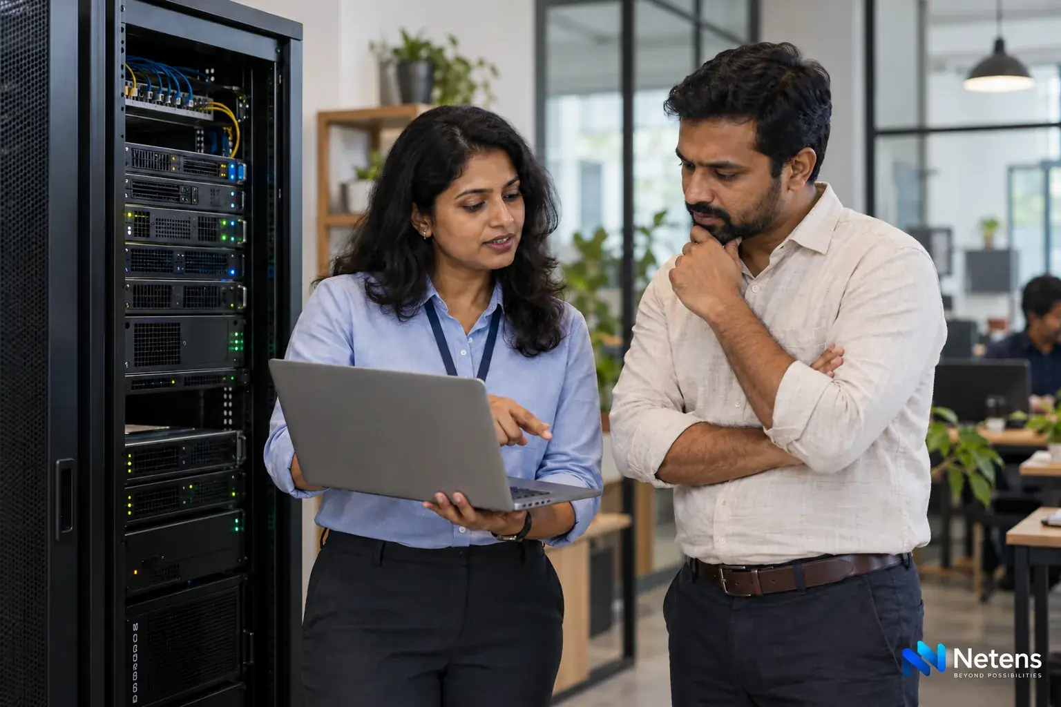 Indian technology manager and business owner reviewing a dedicated server